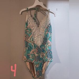 Cute one piece bathing suit. Size XS NWOT